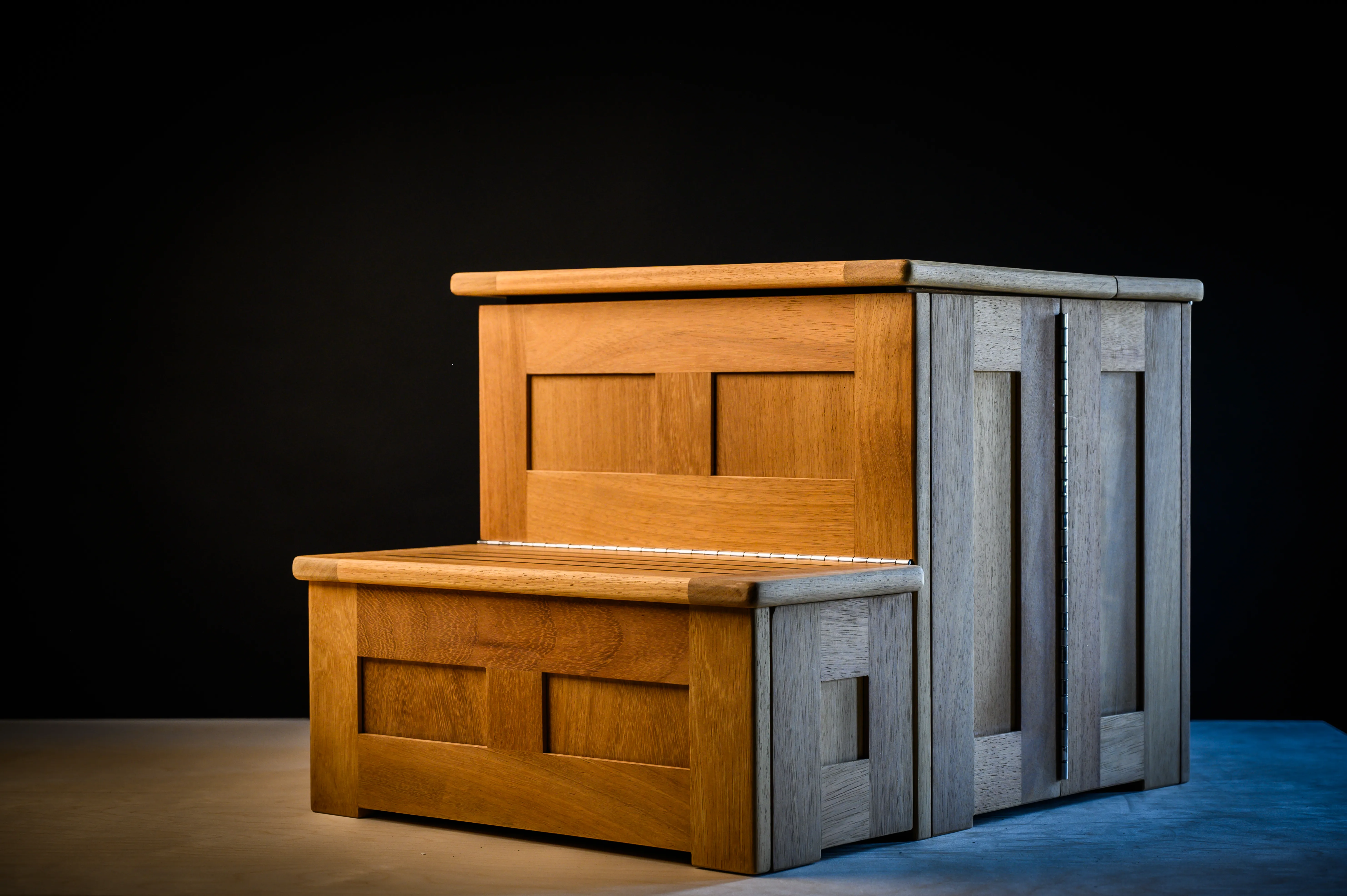 540mm folding dock step deployed - front three-quarter view showing Iroko timber construction