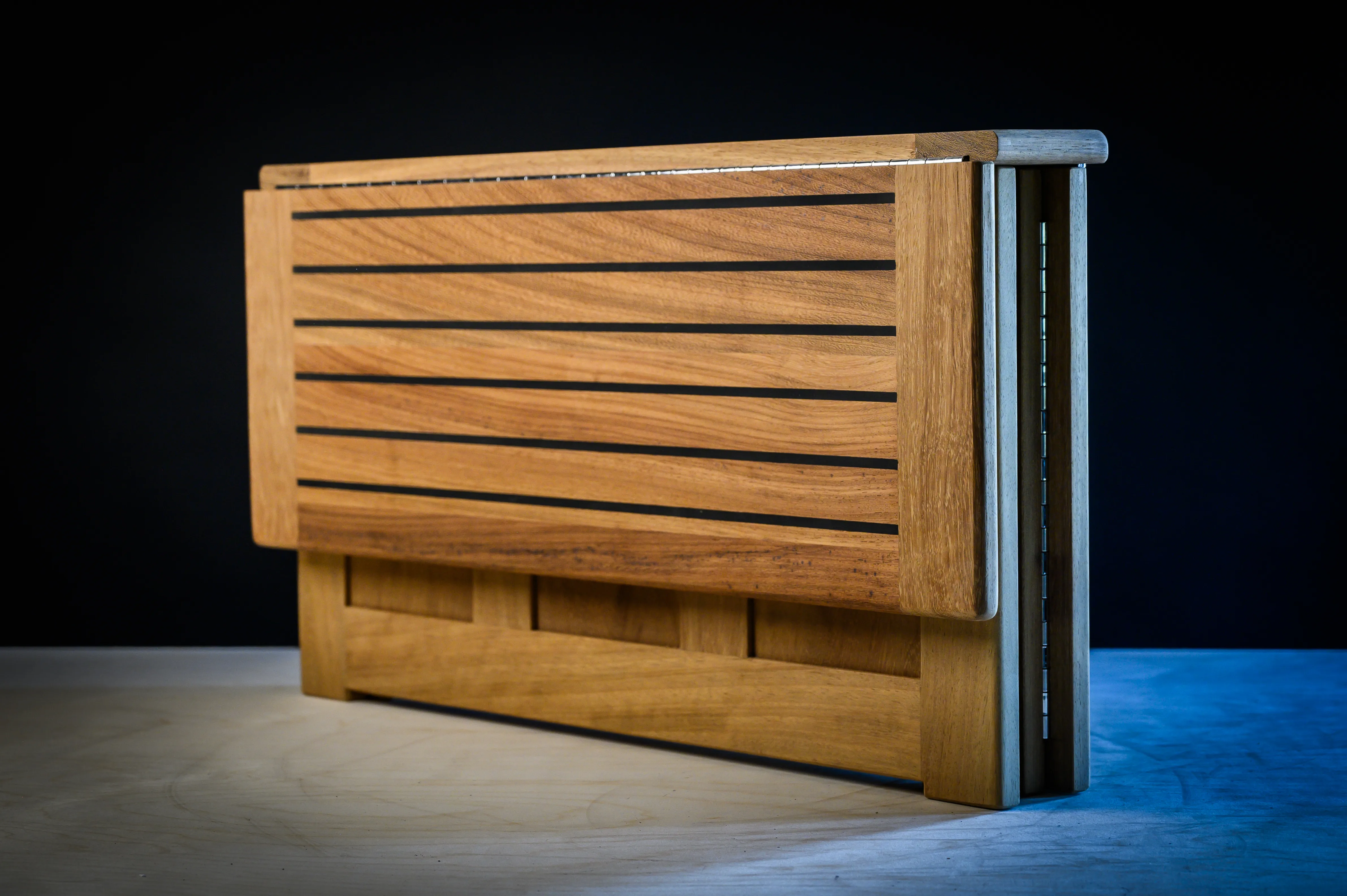 Folding shoe box mid-fold side view